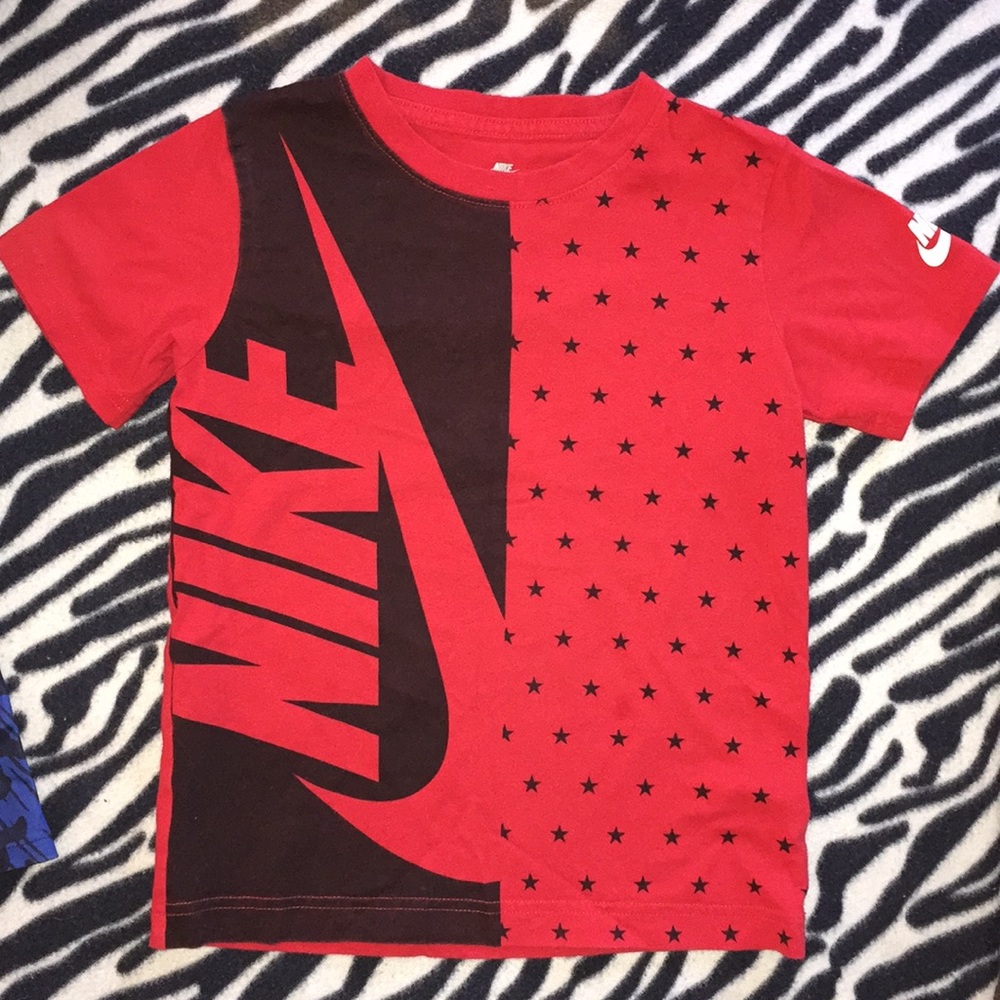 Red Nike Shirt size 6-7 years.